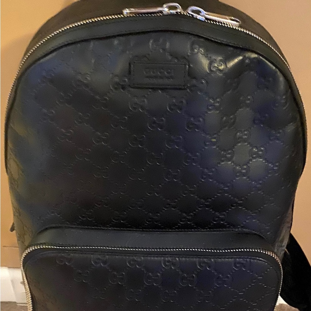 GUCCI Black Guccissima Leather Signature Backpack (used) embossed leather